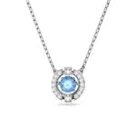 Swarovski Pendentif Sparkling Dance, pièce ronde centrale bleue entourée de cristaux pavés blancs dans un cadre en métal rhodié